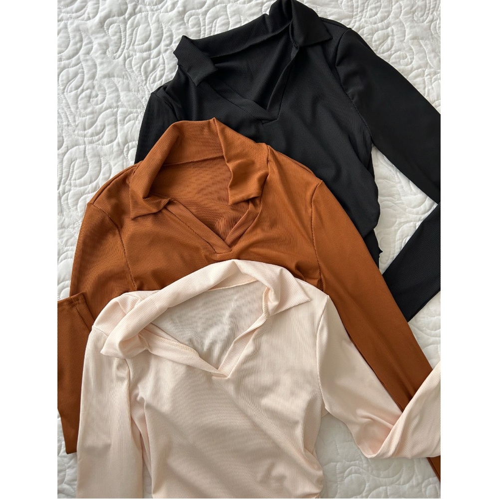 Set of three long sleeved women’s shirts